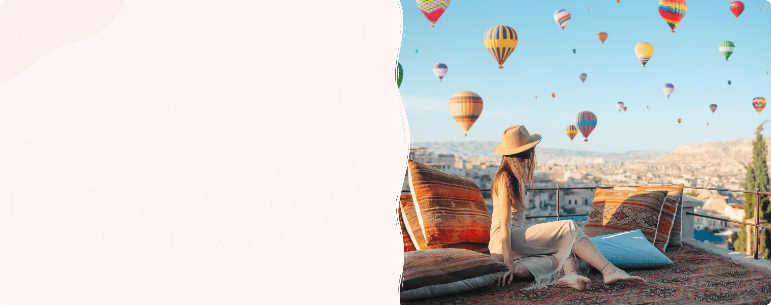 Woman looking at hot air balloons